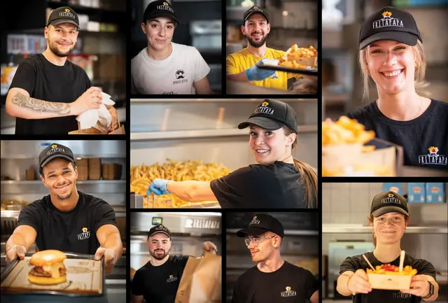 Équipe Fritapapa souriante, en uniforme de la maison